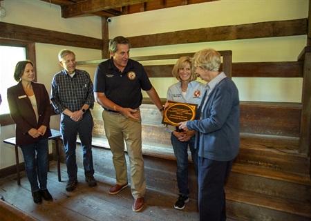  Inside the fully restored Friends Meeting House in Randolph. (l-r) Randolph Mayor Christine Carey, Dr. Nicholas Steneck, Commissioner Deputy Director Stephen Shaw, Commissioner Director Christine Myers and Margaret Steneck. 