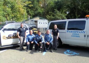 K-9 Boomer with K-9 and animal control officers