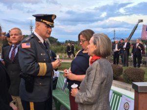 Morris County Sheriff James M. Gannon speaks with Alison Crowther and Honor Crowther Fagan, the mother and sister, respectively, of 9/11 victim Welles Remy Crowther, who died saving others from the South Tower of the World Trade Center. 