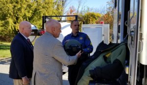 CALEA Assessors Charles Groover and Thomas Clark receive an overview of the Bomb Squad functions and equipment from Morris County Sheriff's Office Detective Sergeant Doug Meyer. 