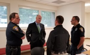 Morris County Sheriff James M. Gannon chats with Livingston Police Officers before the start of a training session on Project Lifesaver taught by Morris County Sheriff's Officers on September 10, 2019.