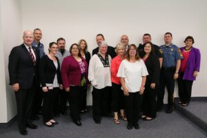 Morris County Sheriff James M. Gannon, L, stands with Detective Lt. Mark Chiarolanza and Sergeant Mike Turkot, Far Right, with FDU instructors and members of a Civil Litigation class that Officers Chiarolanza and Turkot co-designed. 