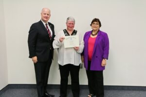 Morris County Sheriff James M. Gannon with Carol Sullivan, Supervisor of the Office's Legal Services Division Finance Unit, and Fairleigh Dickinson University Associate Dean For Continuing Education Dr. Deborah A. Fredericks. 