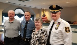 From left, Peter Kenny, Morris County Sheriff's Office Detective Sergeant David Kenny, Edel Kenny, Morris County Sheriff James M. Gannon 