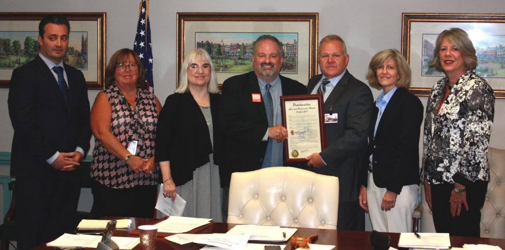 photo: (l/r) Freeholders John Cesaro and Kathy DeFillippo; Lynn Siebert, Arts Participation & Communications Director at Morris Arts; Tom Werder, Executive Director of Morris Arts; and Freeholders Doug Cabana, Christine Myers and Deborah Smith