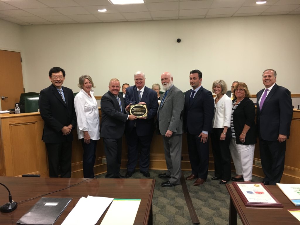 photo at Victory gardens town hall of First Memorial Presbyterian Church in Dover of (l/r) Ray Chang, Freeholders Deborah Smith and Doug Cabana, Pastor Alan Schaefer and Ed Dorsey, and Freeholders John Cesaro, Christine Myers, Kathy DeFillippo, and Tom Mastrangelo