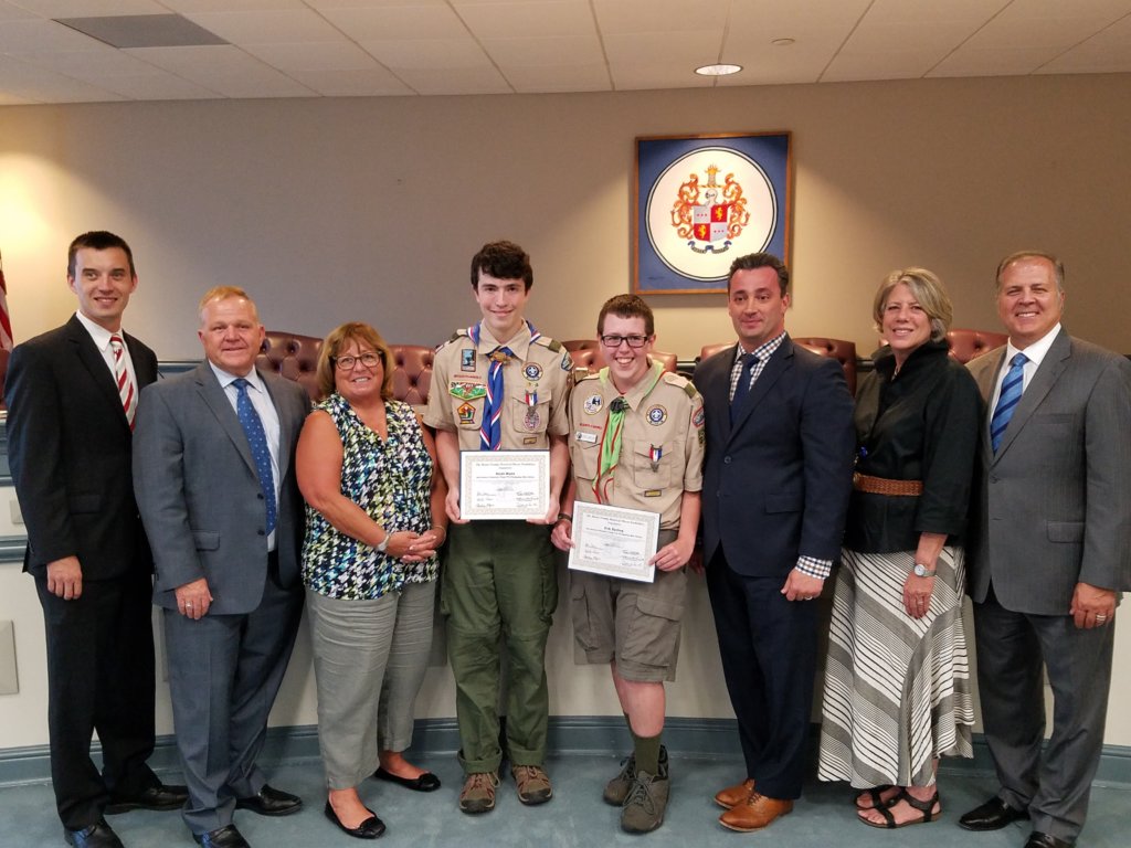 photo of (l/r) Freeholders Doug Cabana and Kathy DeFillippo, Scout Ben Smith, and Freeholders John Cesaro, Deborah Smith and Tom Mastrangelo