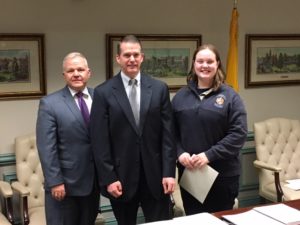 Freeholder Cabana and Michael Peoples with Ashley Napolitano, who talked a couple through child birth in January