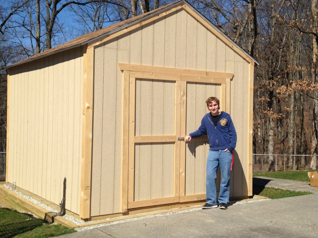 photo of Will Wainscott in front of the storage facility he built for Hanover Township's Bee Meadow Pool complex