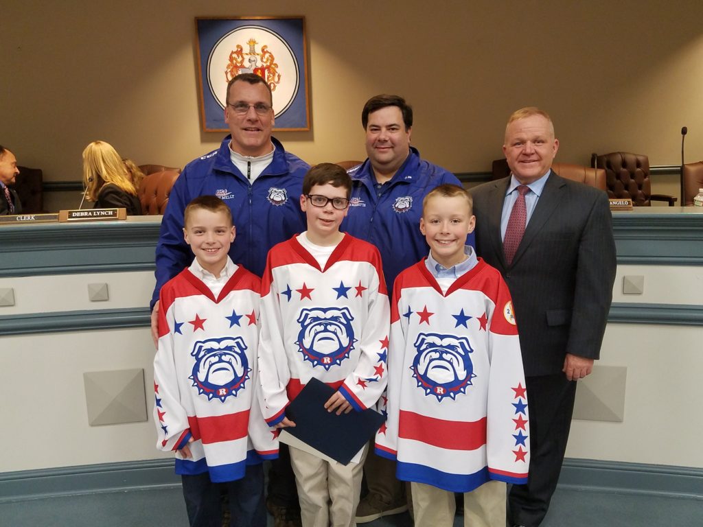 photo of Team members (l/r) Shane Melly, Robert Magnotta and Keegan Melly, with (l/r) coaches Kevin Melly, Rob Magnotta and Freeholder Director Doug Cabana