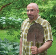 Benjamin Blackburn holding up a shovel