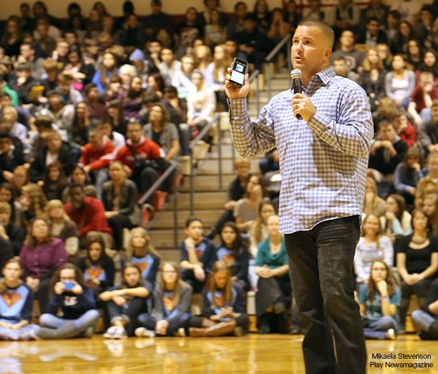 Sgt. Thomas Rich lectures a large crowd of students