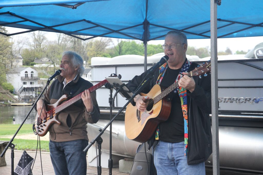 photo of two guitarists entertaining at a previous Block Party