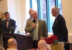 Freeholder Doug Cabana addresses the audience, as Freeholder John Krickus observes