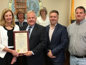 Freeholder Director Doug Cabana presented a resolution to Chester Borough Mayor Janet Hoven when the county governing board met in The Borough in 2017