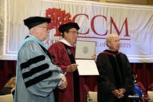 Former Congressman Rodney Frelinghuysen is presented with an honorary degree from Trustee Chair Paul Licitra (center) as President Emeritus Edward J. Yaw looks on.