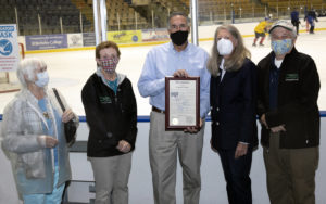 Photo of Morris County Park Commissioners Julie Baron and Betty Cass-Schmidt, retiring Director of Recreation Facilities Reynold Fauci, Morris County Freeholder Director Deborah Smith and Park Commission Vice President Richard Seabury, III.