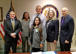 (l/r) Freeholder Doug Cabana, Ashley Reed, (front) Rewaida Muheisen, (back) Christopher Linne, and Freeholders Deborah Smith and John Krickus